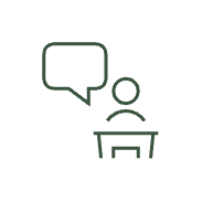 Simple line drawing of a person at a desk with a speech bubble, representing the YCAM Mentorship program.
